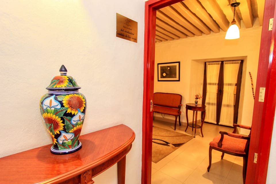 Deluxe Suite, 1 King Bed, Refrigerator & Microwave, City View | 12 bedrooms, in-room safe, iron/ironing board, free WiFi