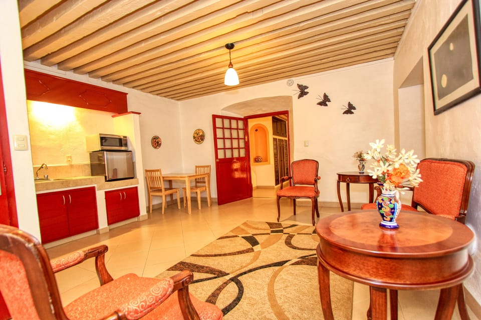Deluxe Suite, 1 King Bed, Refrigerator & Microwave, City View | 12 bedrooms, in-room safe, iron/ironing board, free WiFi