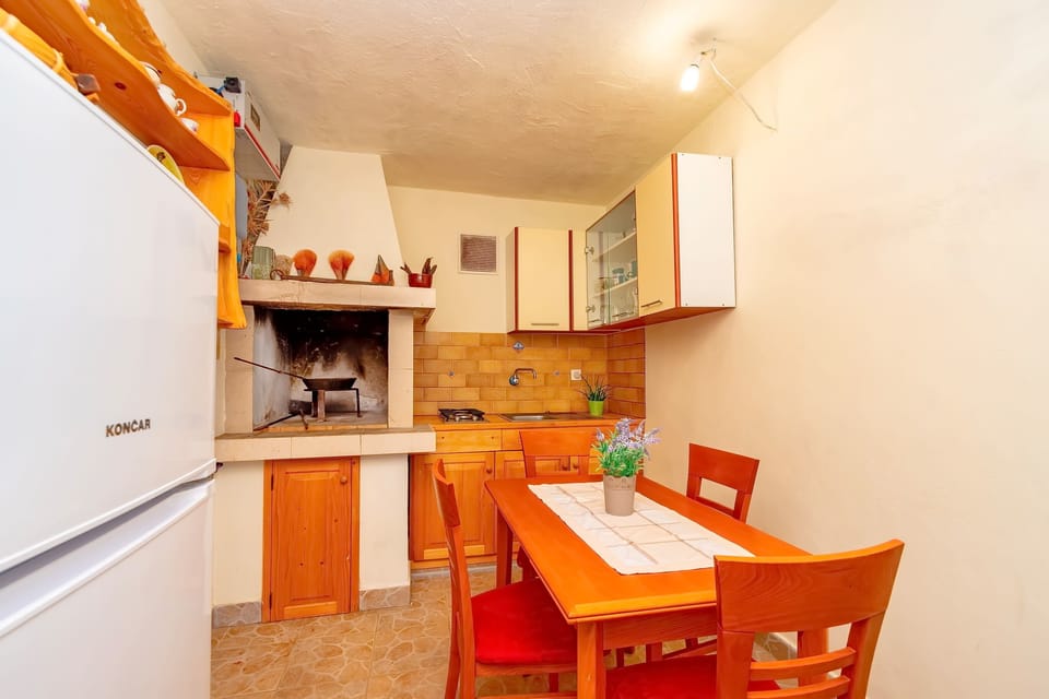 House (One Bedroom House with Terrace) | Private kitchen | Fridge