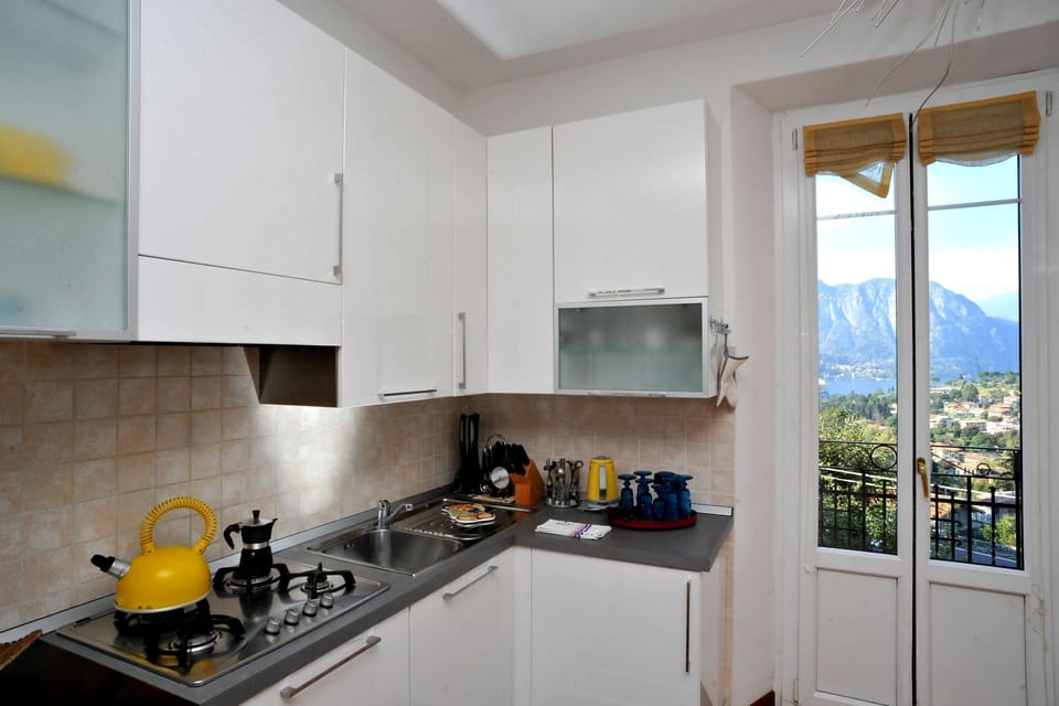 Full-size fridge, microwave, stovetop, coffee/tea maker