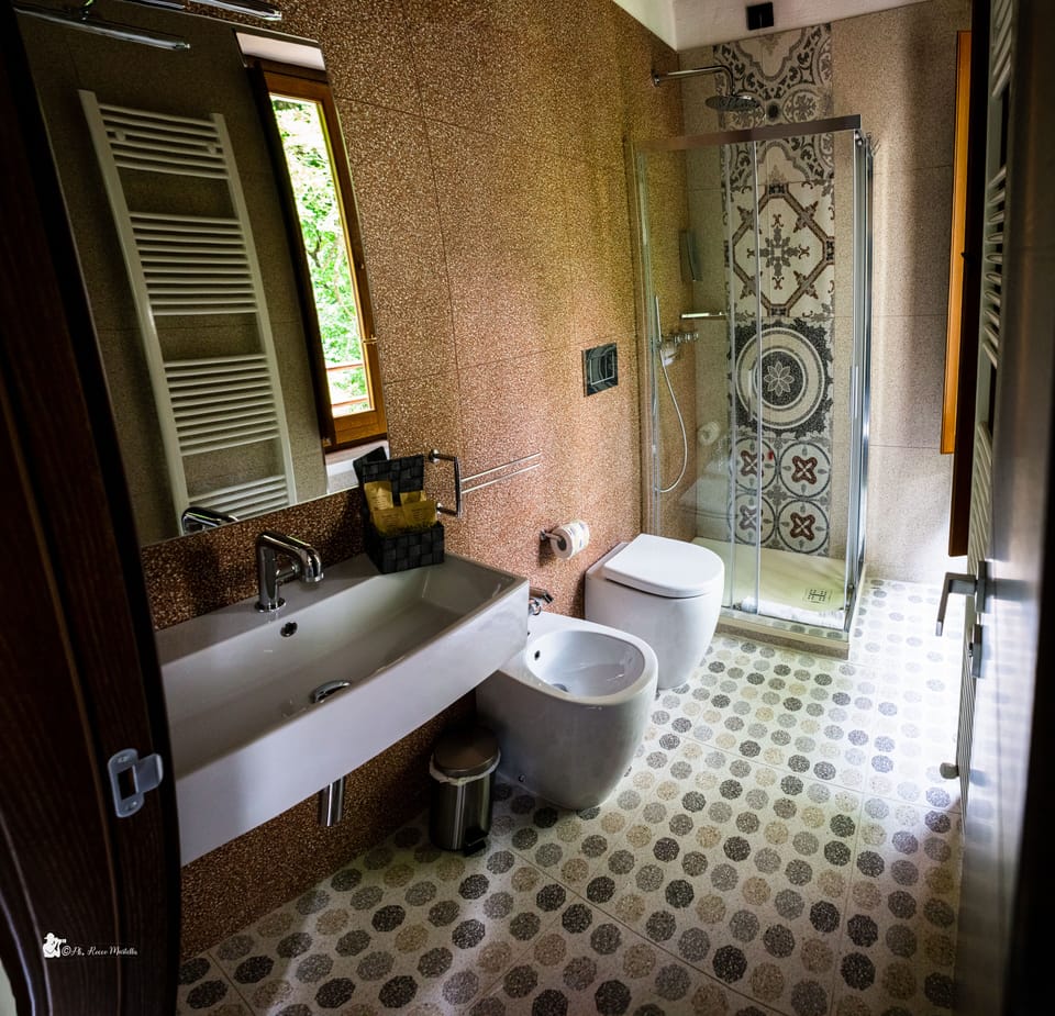 Family Quadruple Room | Bathroom | Shower, rainfall showerhead, hair dryer, slippers