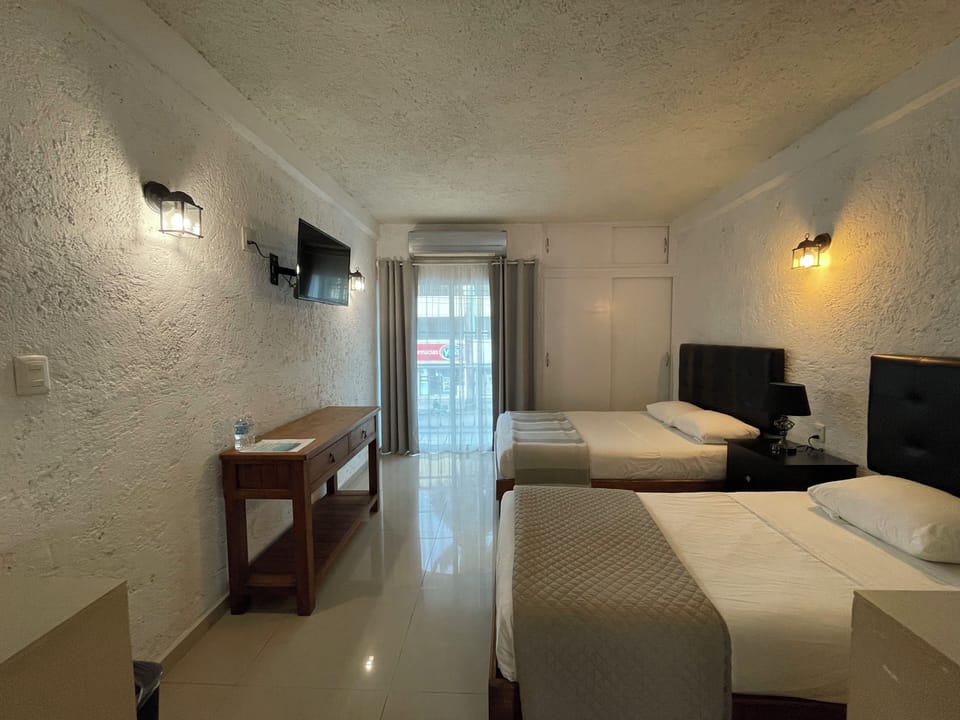 Standard Suite, Multiple Beds, Non Smoking, Balcony | Free WiFi