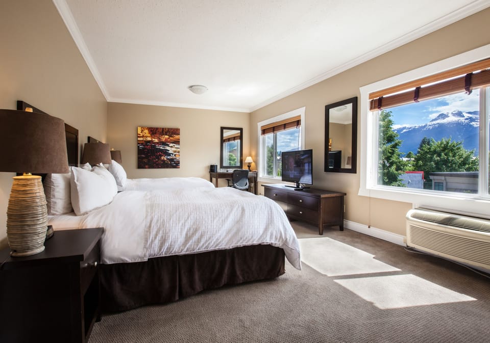 Premium bedding, pillowtop beds, desk, laptop workspace