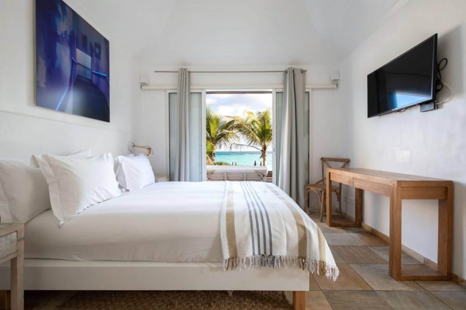 Room, Beachfront | Hypo-allergenic bedding, minibar, in-room safe, desk