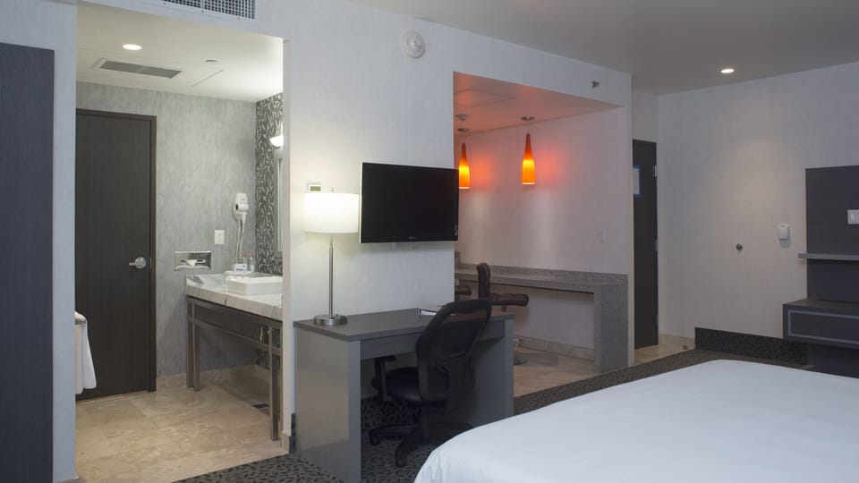 Premium bedding, down comforters, Select Comfort beds, in-room safe