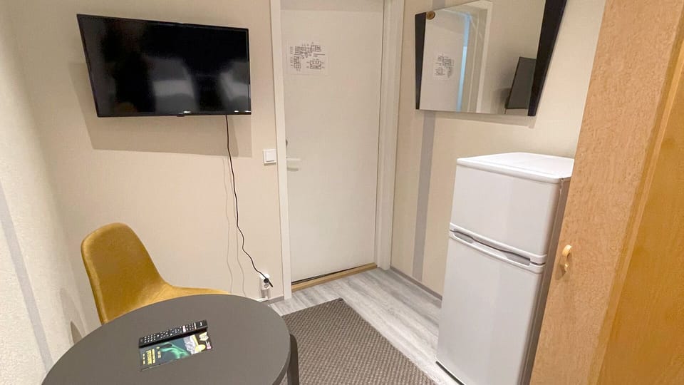 Economy Twin Room, 2 Twin Beds, Non Smoking, Shared Bathroom | Iron/ironing board, free WiFi, bed sheets