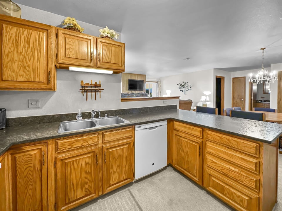 Condo, 2 Bedrooms | Private kitchen | Fridge, microwave, stovetop, dishwasher