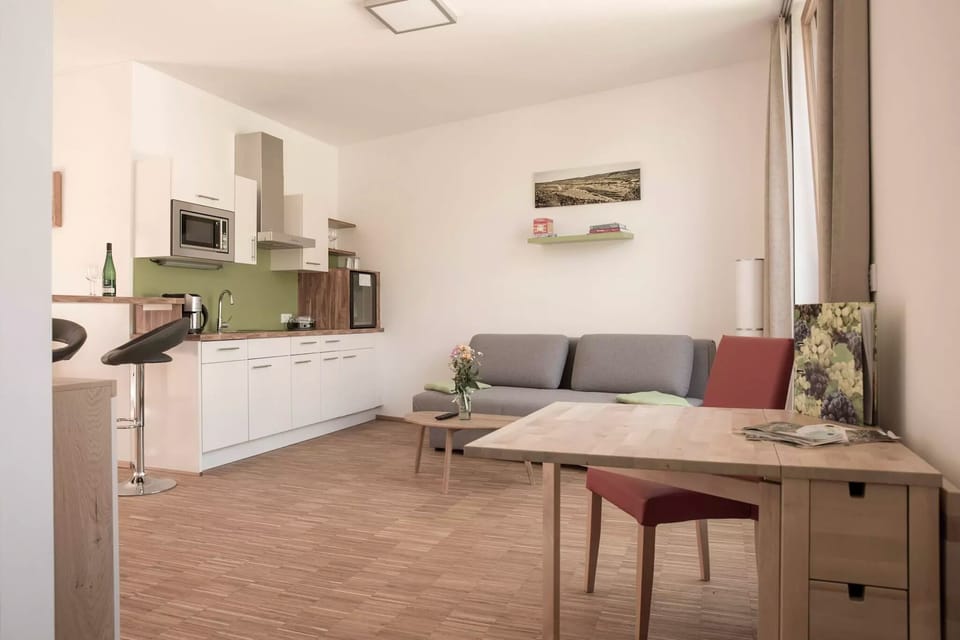 Apartment (Wechselberg) | Living area | 47-inch TV with satellite channels, heated floors
