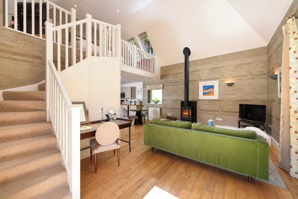 Strathcona Lodge Suite No.14 (Separate Building) | Living area | Flat-screen TV, DVD player