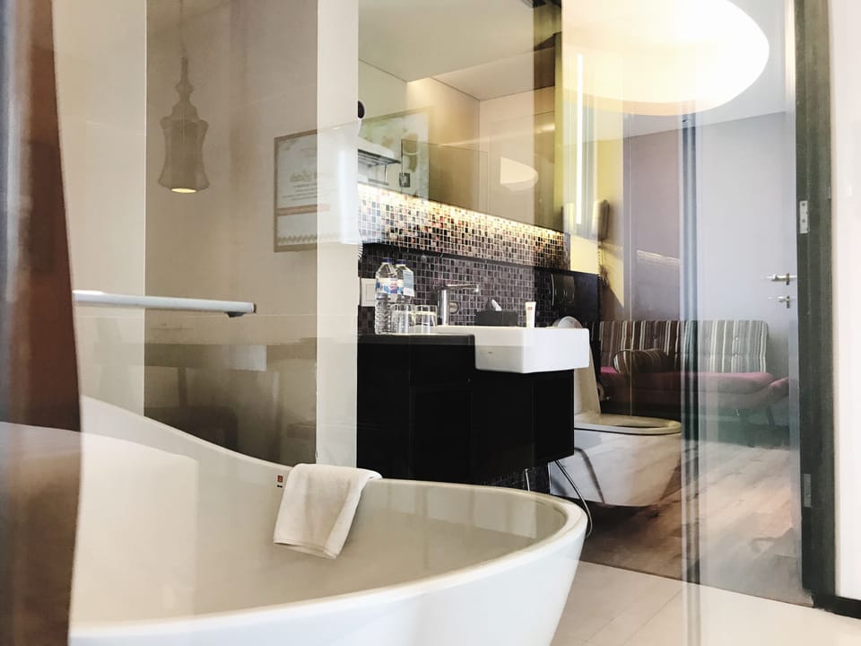 Shower, eco-friendly toiletries, hair dryer, slippers