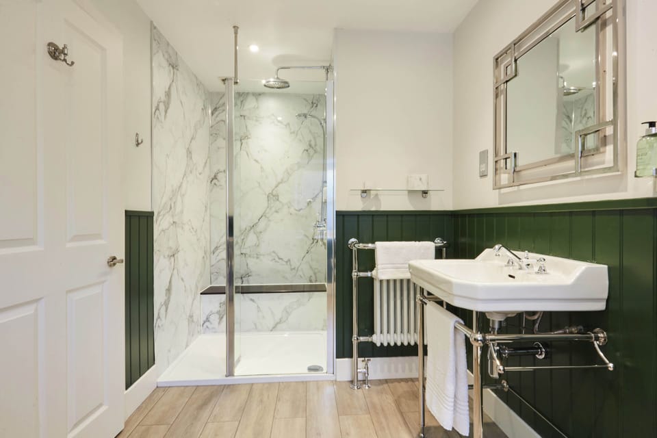 Deluxe Double or Twin Room, Ground Floor (Orchid Room) | Bathroom | Shower, free toiletries, hair dryer, towels