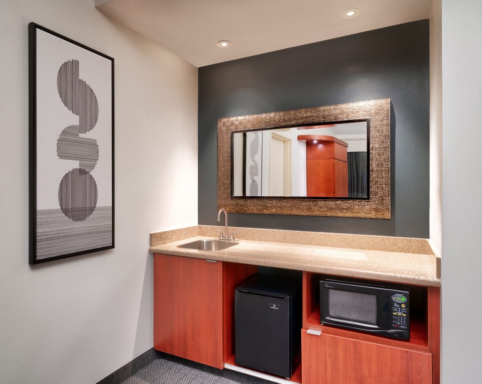 Suite, 1 Bedroom | Desk, laptop workspace, iron/ironing board, free WiFi