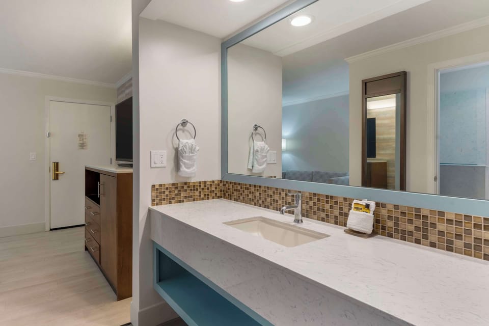 Standard Room, 2 Queen Beds, Non Smoking, Refrigerator & Microwave | Bathroom | Eco-friendly toiletries, hair dryer, towels, soap
