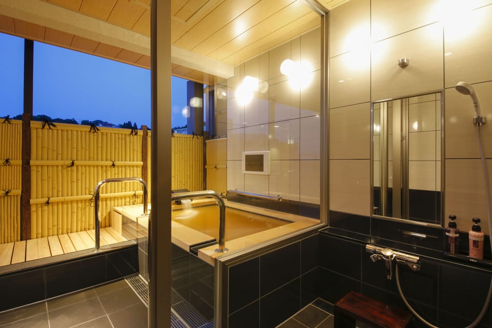 Traditional Suite, Non Smoking (High Class Open-air bath, Futon&Bed) | Bathroom amenities | Combined shower/tub, designer toiletries, hair dryer, slippers