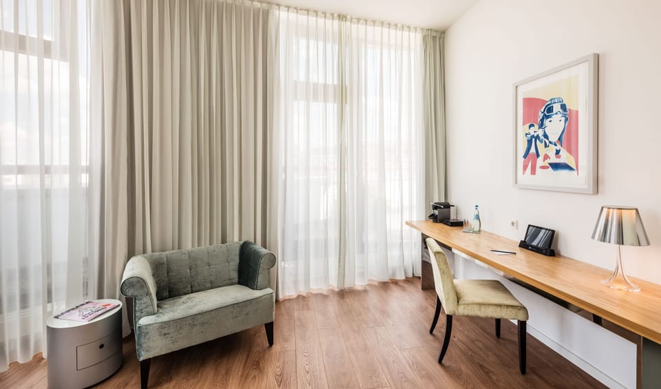 Superior Room | Living area | 40-inch Smart TV with cable channels, TV, offices