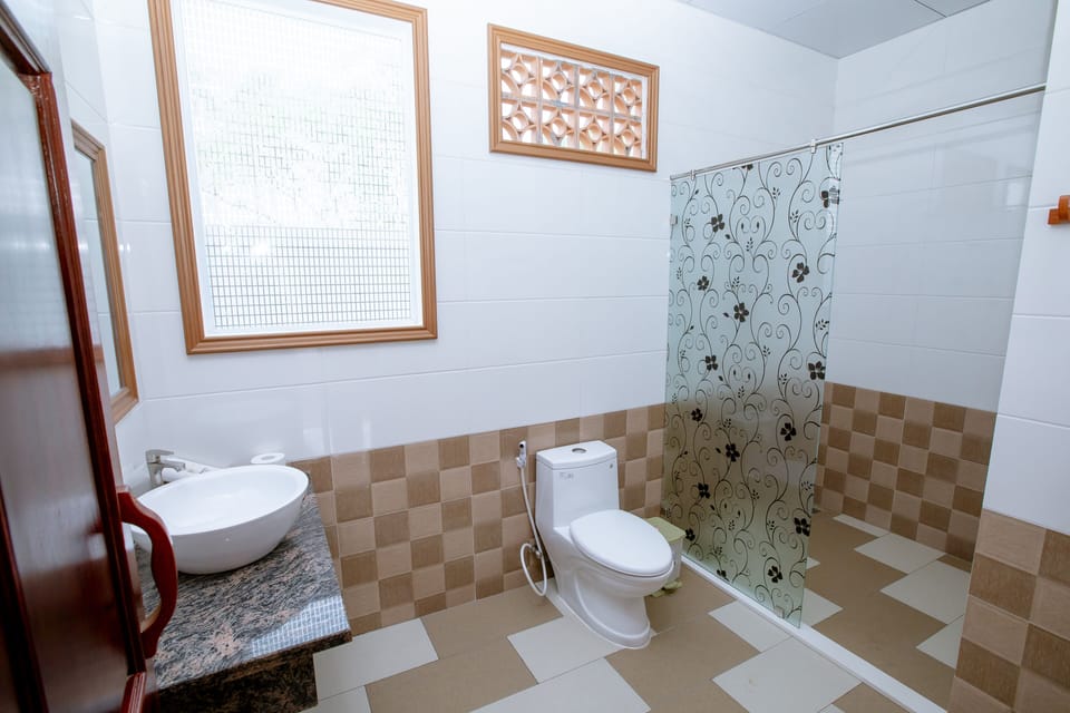 Shower, free toiletries, hair dryer, bathrobes