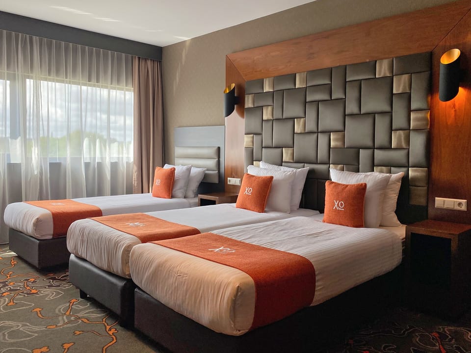 Triple Room | In-room safe, desk, laptop workspace, blackout drapes