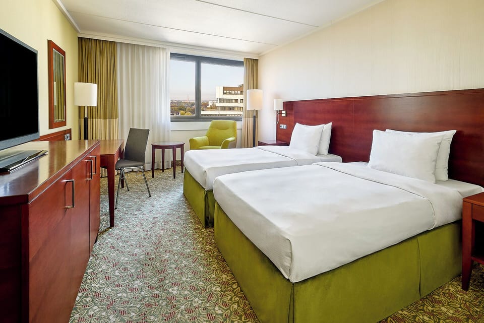 Hypo-allergenic bedding, minibar, in-room safe, desk