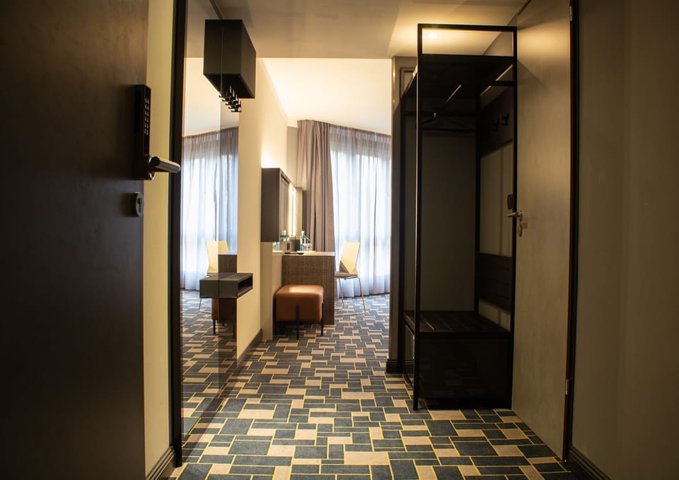 Family Triple Room | Living area | LCD TV, pay movies