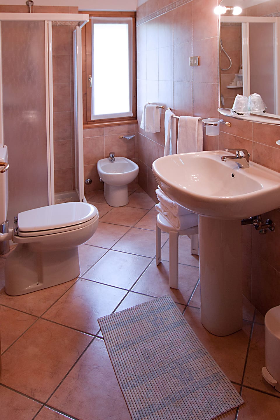 Shower, free toiletries, hair dryer, bathrobes