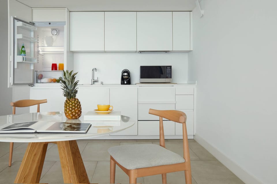 Suite, 1 Bedroom, Non Smoking, Limited View (King Bed) | Premium bedding, memory foam beds, in-room safe, iron/ironing board