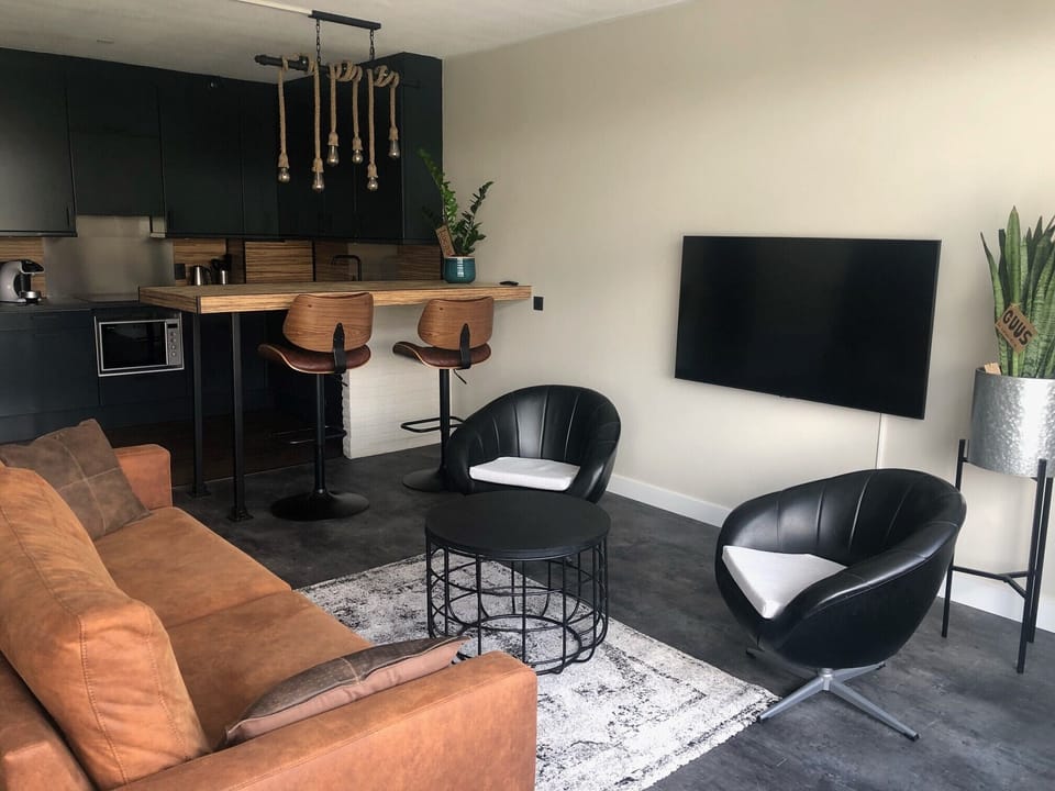 Apartment | In-room safe, desk, blackout drapes, iron/ironing board