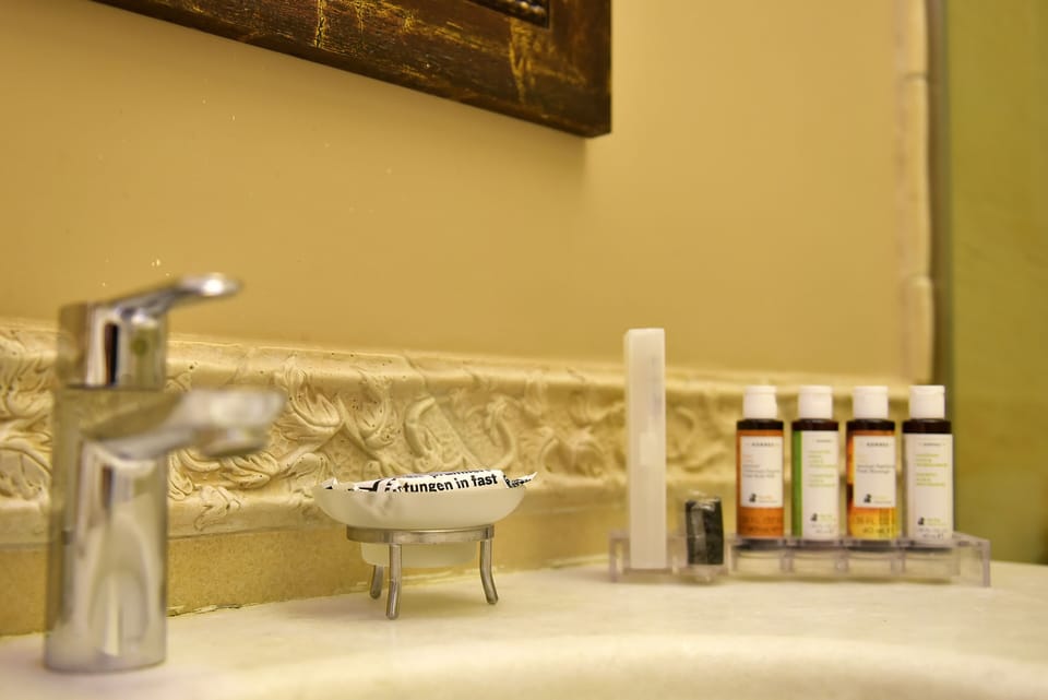 Superior Double Room, Balcony | Bathroom | Jetted tub, designer toiletries, hair dryer, bathrobes