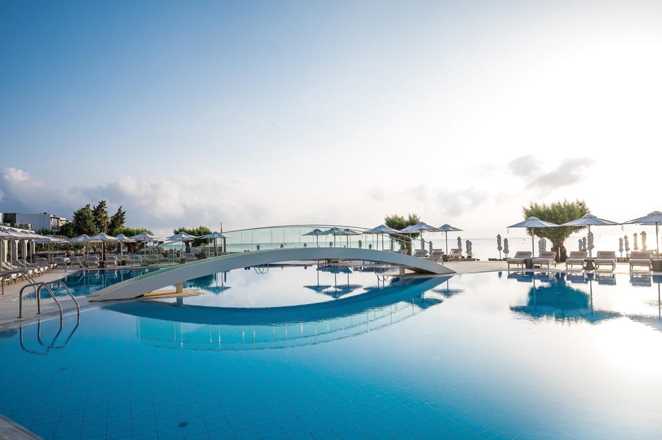 Indoor pool, 15 outdoor pools, open 9:00 AM to 6:30 PM, pool umbrellas