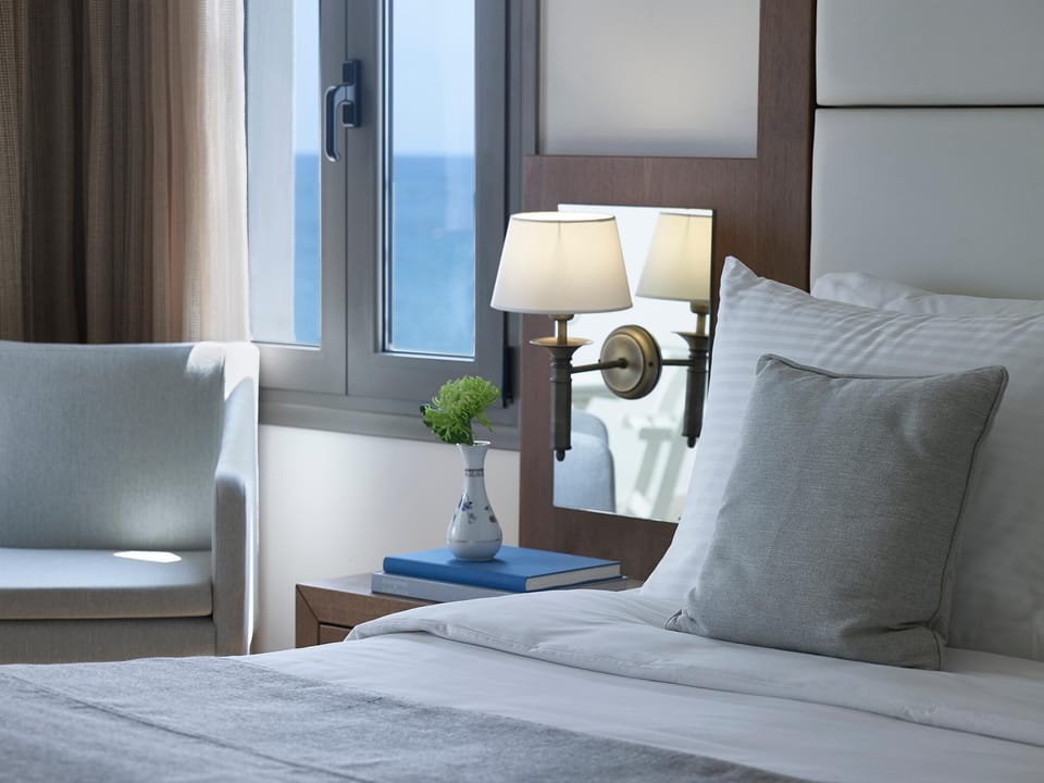 Premium Sea View Suite | Minibar, in-room safe, blackout drapes, iron/ironing board (on request)