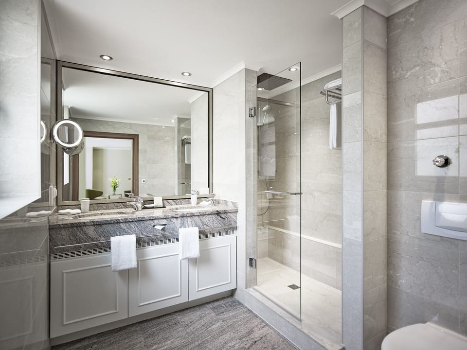 Suite, 1 Bedroom, Garden View | Bathroom | Shower, free toiletries, hair dryer, bathrobes