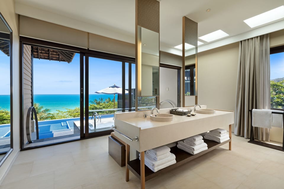 Separate tub and shower, rainfall showerhead, eco-friendly toiletries