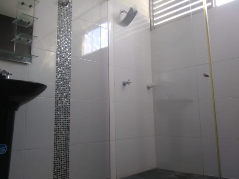 Shower, towels, soap, toilet paper