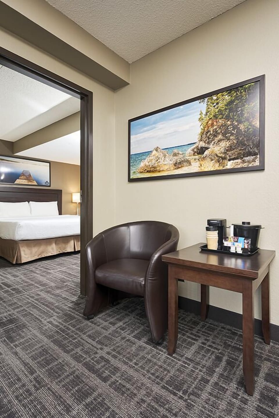 Family Suite | Living area | 50-inch flat-screen TV with cable channels, TV