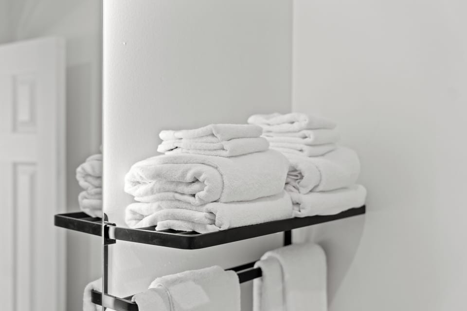Comfort Room, 2 Queen Beds, Kitchen | Bathroom | Combined shower/tub, towels, toilet paper