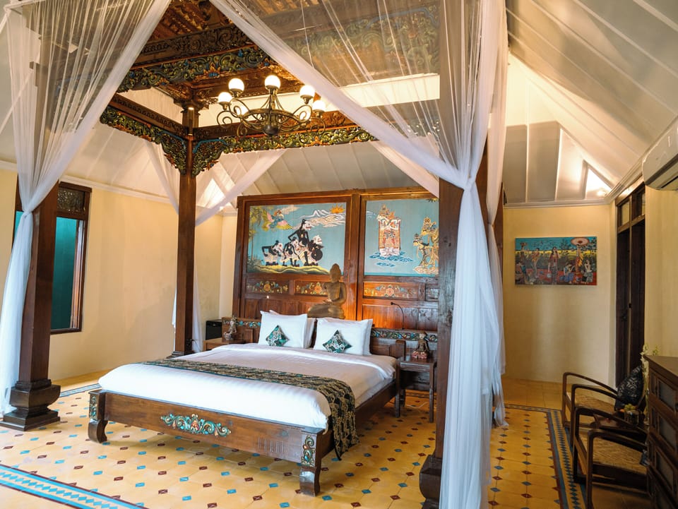 Suite, 1 King Bed | Free minibar items, in-room safe, individually decorated, desk