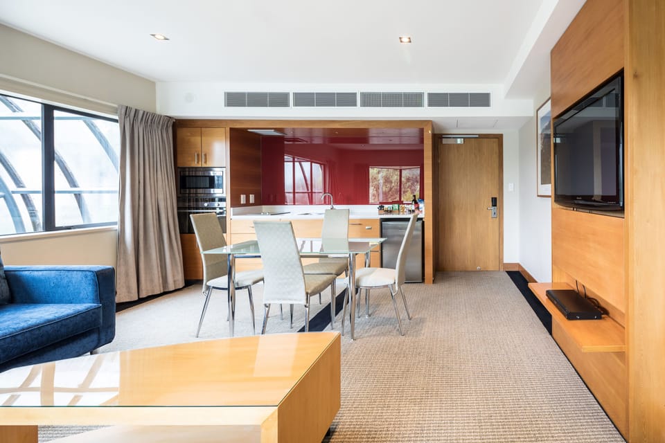 Premium Suite, 1 King Bed, Garden View | Living area | 32-inch LCD TV with satellite channels, TV