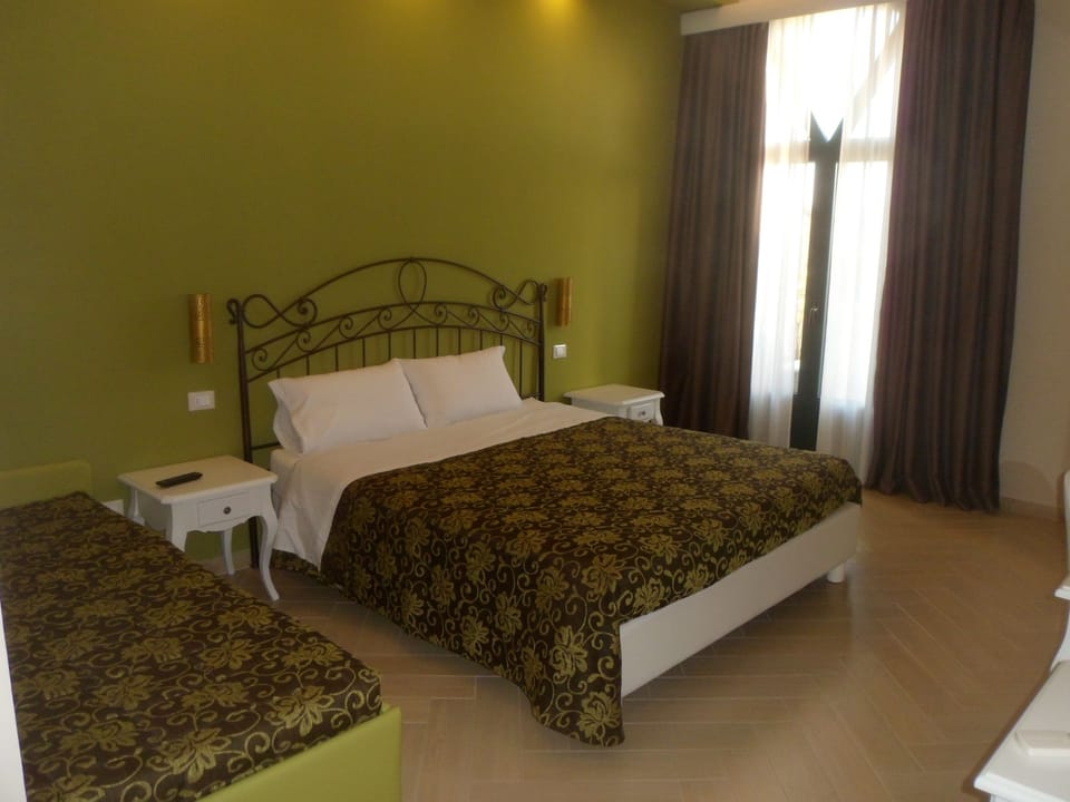 Superior Triple Room | Premium bedding, minibar, in-room safe, individually furnished