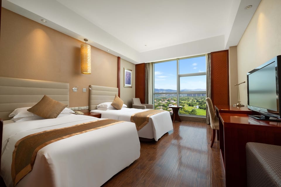 Standard Twin Room | Free minibar items, desk, laptop workspace, blackout drapes