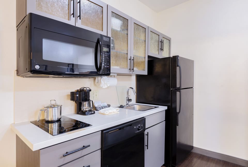 Pillowtop beds, desk, laptop workspace, blackout drapes