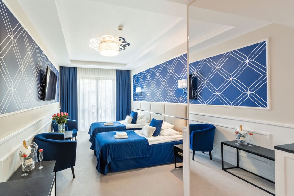 Deluxe Double Room | Minibar, in-room safe, desk, iron/ironing board