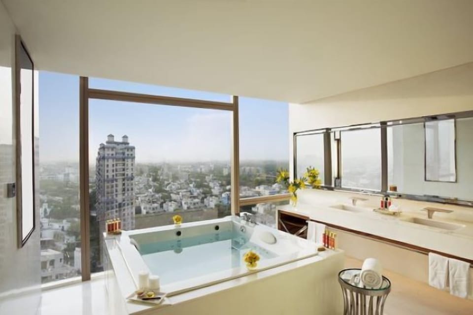 Presidential Suite with Bath Tub, Club Lounge Access | Bathroom | Separate tub and shower, rainfall showerhead, designer toiletries