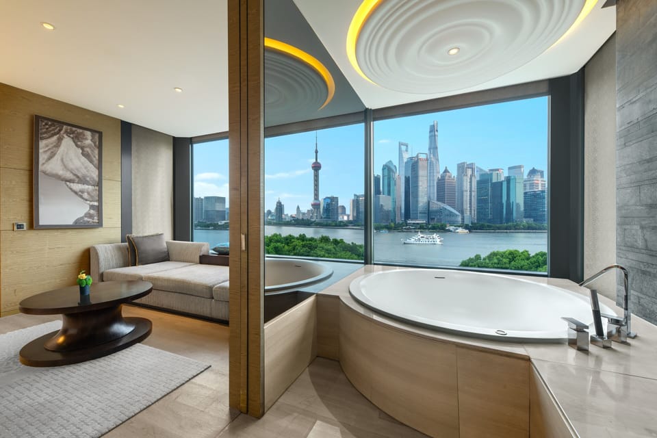 Separate tub and shower, rainfall showerhead, free toiletries