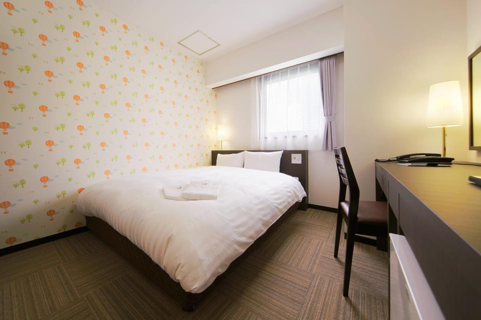Desk, blackout drapes, iron/ironing board, free WiFi
