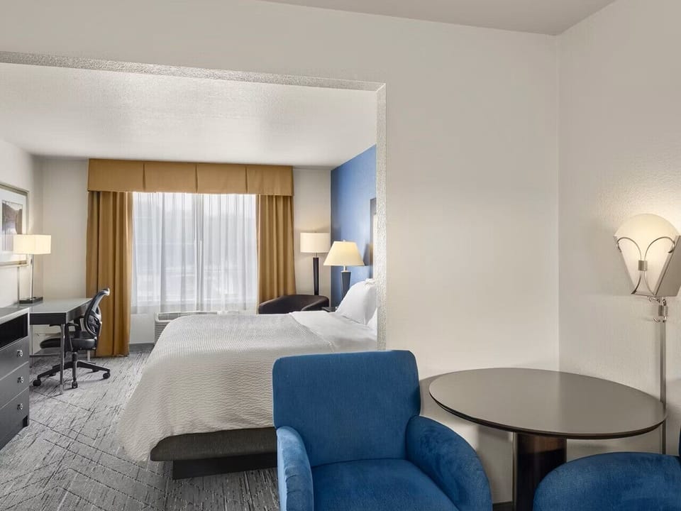 Suite, 1 King Bed with Sofa bed (Wet Bar) | Iron/ironing board, free WiFi, bed sheets