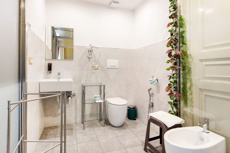 Double Room, Balcony, City View | Bathroom | Shower, rainfall showerhead, free toiletries, hair dryer