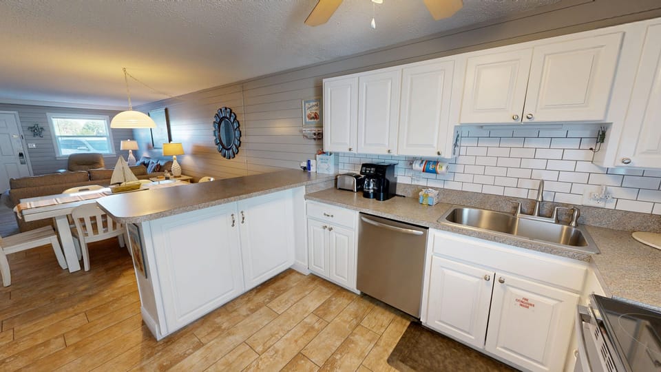 Condo, 2 Bedrooms | Private kitchen | Fridge, microwave, oven, dishwasher