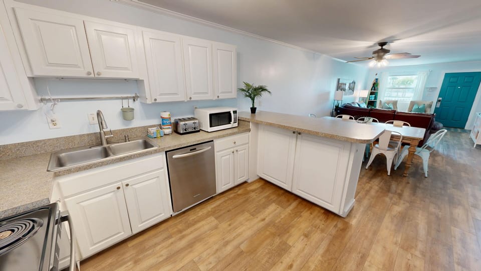 Condo, 2 Bedrooms | Private kitchen | Fridge, microwave, oven, dishwasher