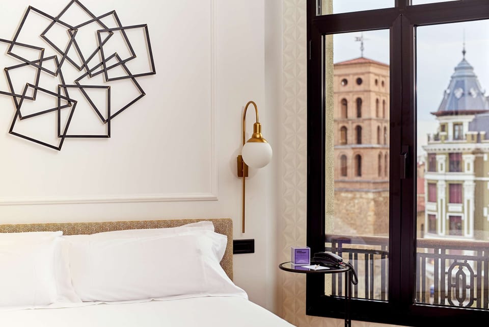Down comforters, minibar, in-room safe, desk