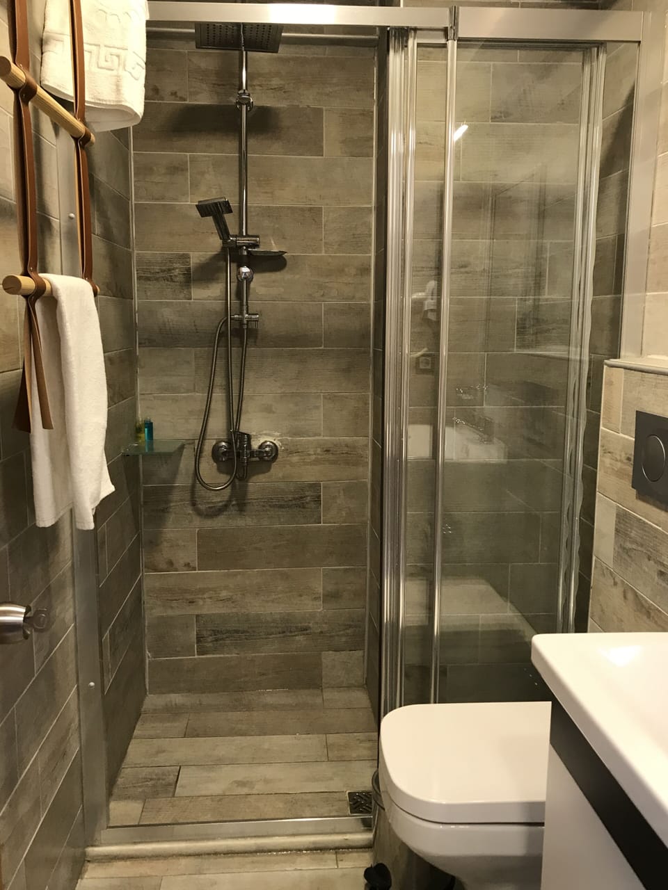 Shower, rainfall showerhead, eco-friendly toiletries, hair dryer