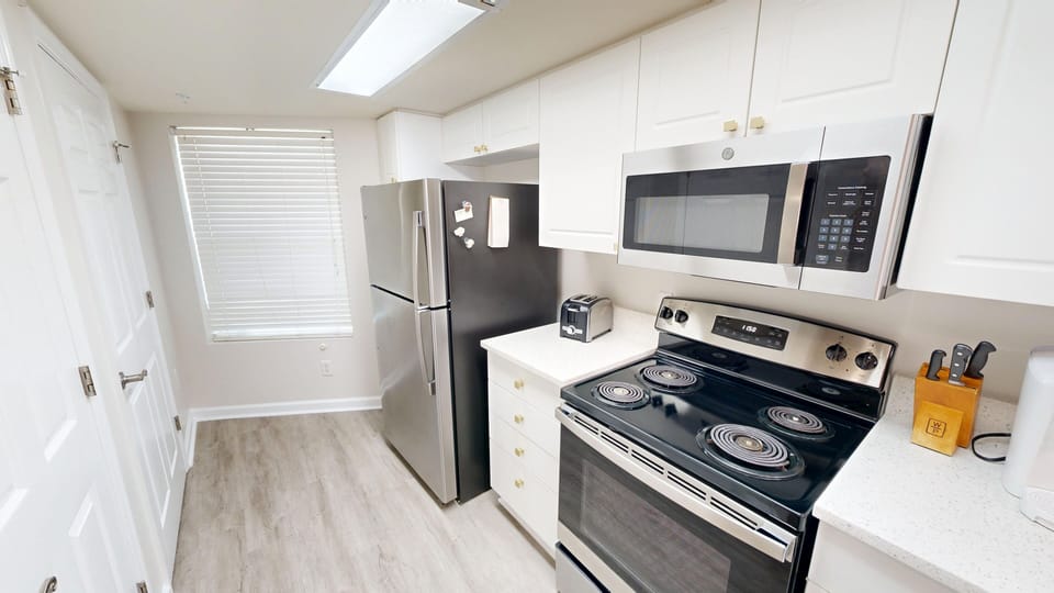 Condo, 2 Bedrooms | Private kitchen | Fridge, microwave, coffee/tea maker, toaster